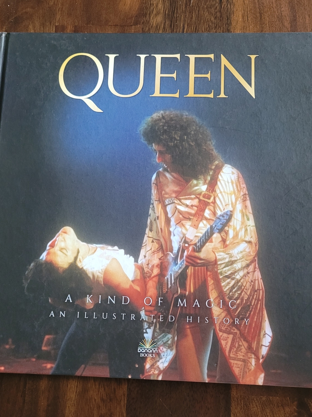 Queen: A Kind of Magic Illustrated History - Black & Gold Cover